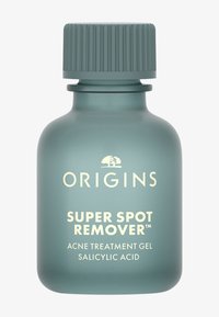 Grønn frostet glassflaske med en ripete kork. Etiketten lyder "Origins Super Spot Remover™ Aknebehandlingsgel med salisylsyre."