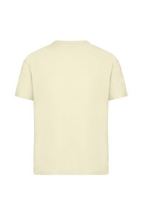 Short-sleeve t-shirt in light yellow cotton, featuring a crew neckline and a relaxed fit with a smooth texture and no graphic elements.