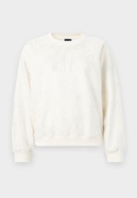 Krémový sweatshirt s textúrovaným povrchom, s okrúhlym výstrihom, dlhými rukávmi a predným logom s nápisom "GAP" v svetlomodrej farbe.