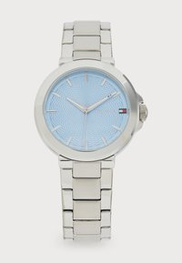 Silver stainless steel watch with a round case, blue textured dial, silver hour markers, and a linked bracelet strap.