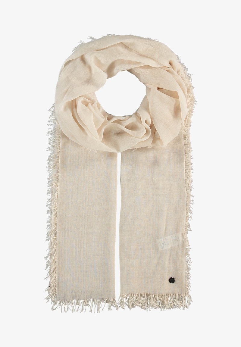 Écharpe beige en tissu léger, avec un bord effiloché et un petit accent noir. Le design est simple avec une texture douce.