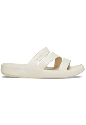 Sandale beige à enfiler avec deux larges brides et une semelle épaisse, conçue pour une utilisation décontractée et le confort.