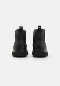Calvin Klein Jeans LUG MID CHELSEA BOOT  - Stivaletti - black