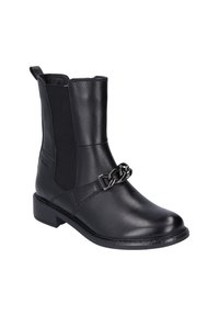 Black leather ankle boot featuring elastic side panels, a chain accent, and a low heel. Smooth texture with stitched detailing.