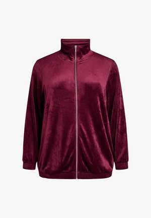 Burgundy zip-up jacket made of soft velvet. Features a high collar, long sleeves, elastic cuffs, and a relaxed fit for comfort.