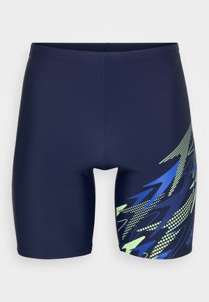 Marinefarbene Schwimmshorts aus elastischem Material mit einem grafischen Design aus blauen und neongrünen Zickzackmustern auf der linken Seite.