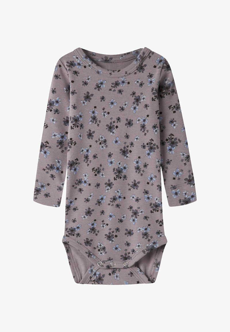 Body bébé manches longues en violet doux avec un petit imprimé floral bleu et noir et trois boutons pression à l’entrejambe.