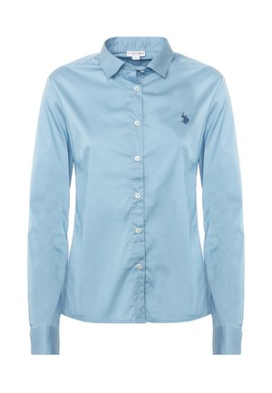 Camicia button-up azzurra chiara realizzata in tessuto liscio, con colletto classico, maniche lunghe e logo ricamato sul petto.
