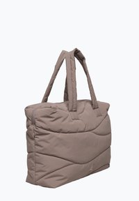 Torba na ramię w jasnobrązowym kolorze z pikowanym wzorem. Posiada dwa solidne uchwyty oraz górny zamek dla pewnego zamknięcia.