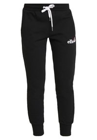 Pantalones de chándal negros de tela suave, con cintura elástica y cordón blanco, piernas ajustadas y logo bordado en el muslo.
