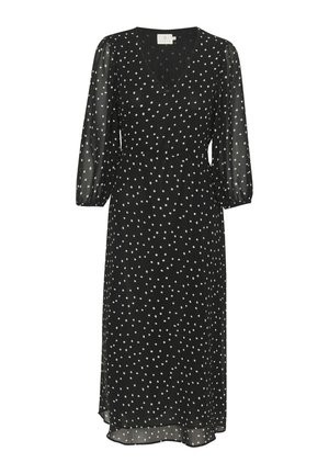Svart klänning med V-ringning och trekvartsärmar, prydd med vita prickar, tillverkad av lätt material, med en flödande silhuett.