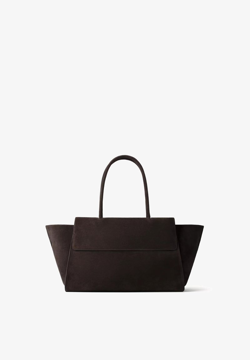 Sac à main cabas structuré noir avec de larges panneaux latéraux et une seule anse supérieure sur fond blanc.