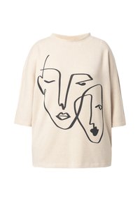 Beżowa, oversize T-shirt wykonana z mieszanki bawełny, z czarną ilustracją twarzy narysowaną linią z przodu. Krótkie rękawy i okrągły dekolt.