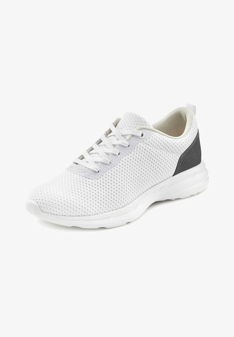 White mesh athletic shoe with a textured upper, gray accents on the heel, and a cushioned sole. Features six eyelets for laces.