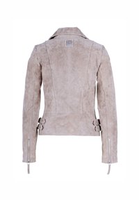 Beige suède jasje met kraag, verticale naden, zijgespen en ritsmanchetten. Heeft een klein logo-embleem op de achterkant.