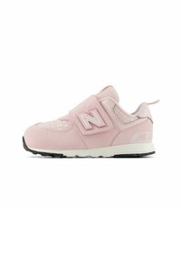 Light pink sneaker with a textured suede upper, adjustable strap, and rubber sole. Features a prominent ‘N’ logo and black outsole.