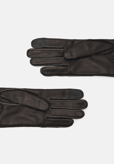 Schwarze Lederhandschuhe mit glatter Textur, ausgestattet mit kontrastierenden weißen Nähten und touchscreen-kompatiblen Fingerspitzen an zwei Fingern.