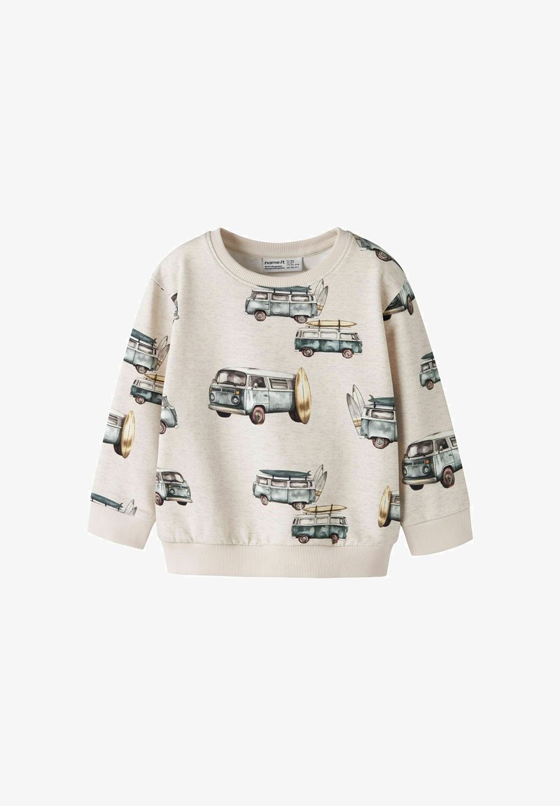 Sweat-shirt beige à manches longues avec des Vans vintage bleues et des planches de surf imprimées partout, poignets et ourlet côtelés.