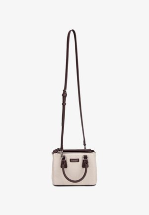 Piccola borsa a tracolla in tela beige con manici in pelle marrone scuro, tracolla regolabile e chiusura superiore con cerniera.