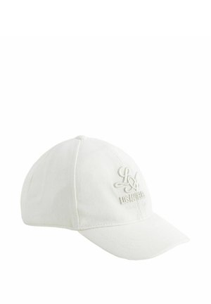 Casquette de baseball en coton blanc présentant un logo "LA" brodé en relief sur le devant, texture lisse et visière incurvée.