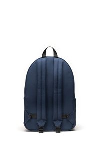 Zaino blu navy con spallacci regolabili imbottiti, manico nero e tasche laterali in rete, mostrato da dietro su uno sfondo bianco.