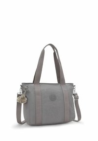 Borsa tote in tessuto grigio con doppi manici, tracolla regolabile e un accento con logo rotondo. Presenta un portachiavi peloso attaccato.