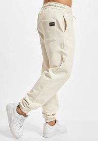 Rockamora HERREN ATLANTA - Jogginghose - offwhite