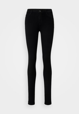 Black skinny jeans made of stretchy denim, featuring a front button closure, five pockets, and a sleek, smooth texture.