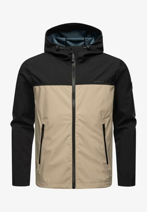Chaqueta de hombre con parte superior negra y sección inferior beige. Cuenta con una capucha, cierre frontal con cremallera y dos bolsillos laterales con cremalleras negras.