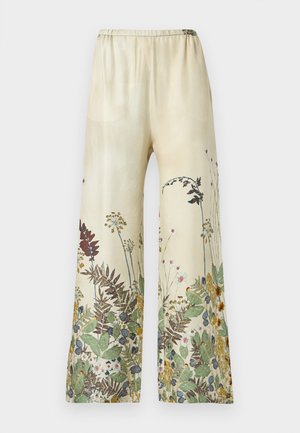 Pantalon à jambes larges en tissu léger, avec un fond beige orné d'imprimés botaniques multicolores en vert, rouge et jaune. Taille élastique.