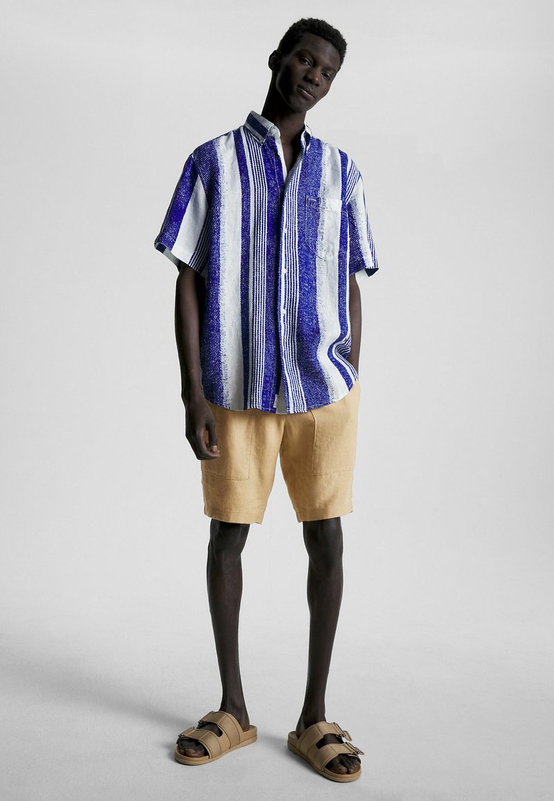 Tommy Hilfiger HARLEM UTILITY Shorts classic khaki/khaki Zalando