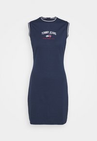 Sleeveless navy blue fitted dress with white striped trim and "Tommy Jeans New York City" logo on chest.