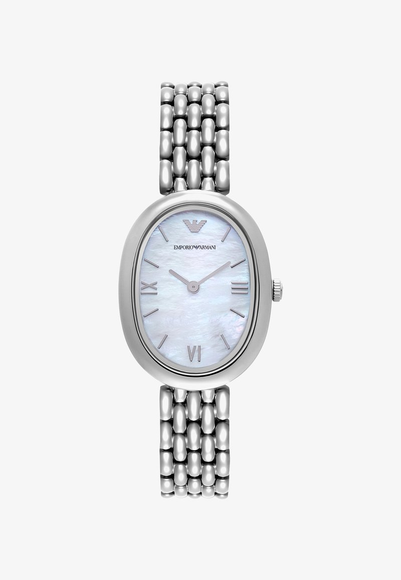 Silver oval klocka med en urtavla i pärlemor, romerska siffror och ett polerat länkarmband. Har logotypen högst upp på urtavlan.