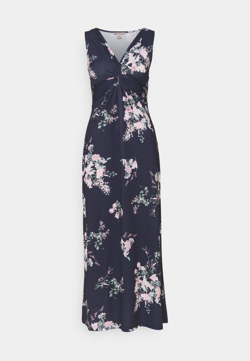 Robe maxi sans manches bleu marine avec motifs floraux roses et blancs et un détail de nœud torsadé au col en V.