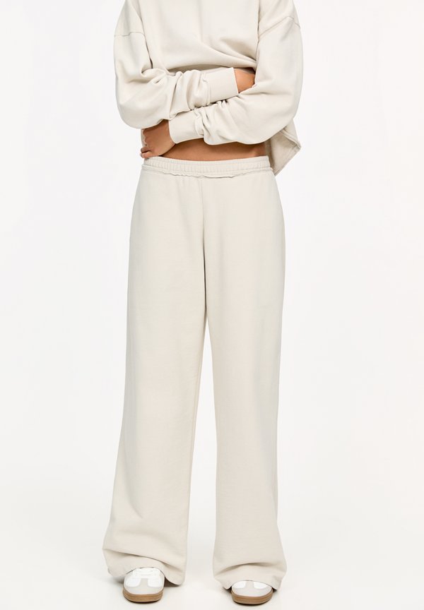 WITH FRAYED WAIST  - Jogginghose - beige