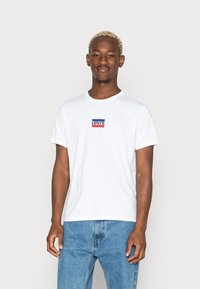 Levi's® - GRAPHIC CREWNECK TEE - T-shirts med print -  white Miniatyrbilde 1