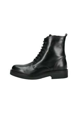 Bottines en cuir noir avec un bout rond, des lacets à l'avant et des détails de couture. Semelle en caoutchouc et tirette à l'arrière. Texture lisse.