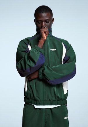 Bershka Tréning dzseki - olive