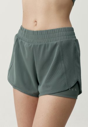 Born Living Yoga, PADMA 2.0 - Kurze Sporthose - verde