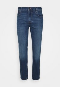 Men’s slim-fit blue denim jeans with front pockets, belt loops, and button closure, displayed against a white background.