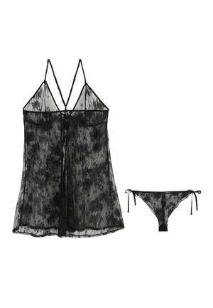 Ensemble de lingerie en dentelle noire transparente avec motifs floraux, comprenant un babydoll à bretelles spaghetti et un string assorti à nouer sur les côtés.