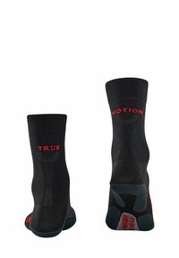 Czarne skarpetki sportowe z ryflowaną teksturą, z napisem "TRUE" i "MOTION" w czerwonym kolorze. Kontrastowe szare akcenty na części stopy.
