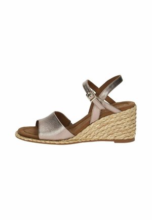 Wedge sandal with a metallic rose-gold leather upper, open toe, ankle strap with buckle, and woven jute wedge heel.