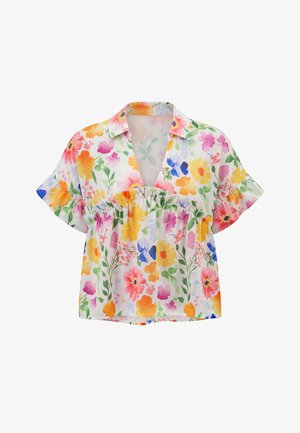 Fehér rövid ujjú blúz fodros derékrésszel és élénk virágmintával sárga, rózsaszín, narancs, kék és zöld árnyalatokban.