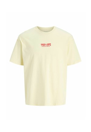 Krem kortærmet t-shirt med rød tekst "TACO LIBRE CIUDAD DE MÉXICO" centreret på brystet.