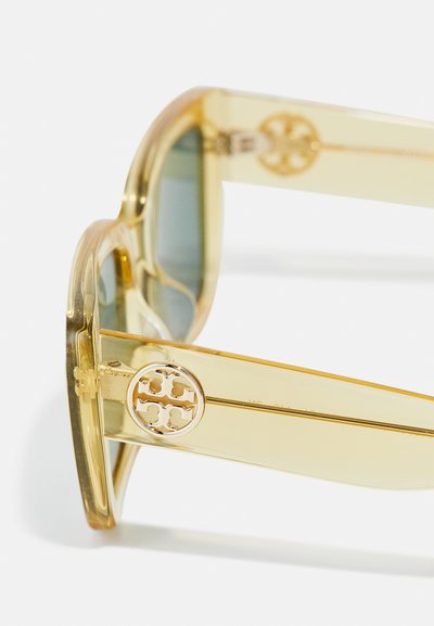 Tory Burch Aurinkolasit - transparent yellow