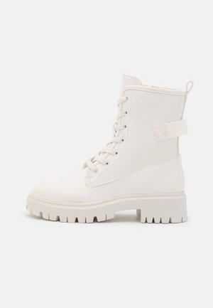Bottines à plateau - off-white