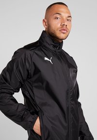 Puma LIGA RAIN CORE Hardshell jacket black/white/black