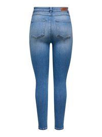 Jean skinny taille haute bleu avec décoloration sur l'arrière des cuisses, deux poches arrière, passants de ceinture et une petite étiquette en cuir marron sur la ceinture.