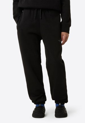 The North Face REFLECTIVE LOGO JOGGER UNISEX - Verryttelyhousut - black